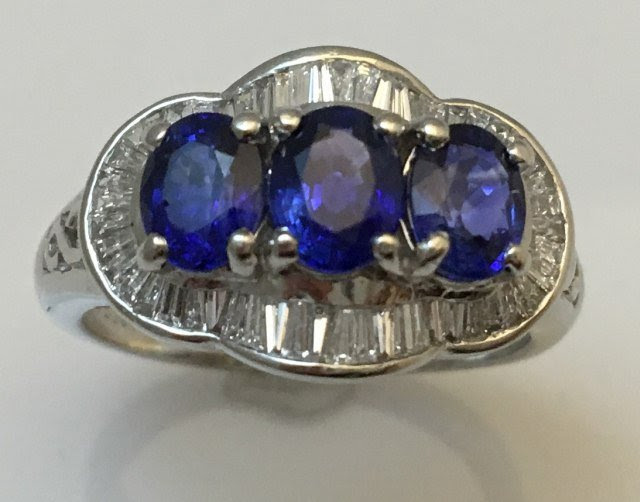 Platinum, natural blue sapphire and diamond ladies ring, size 7 3/4. Estimate: $3,000-$5,000. Don Presley Auction image 
