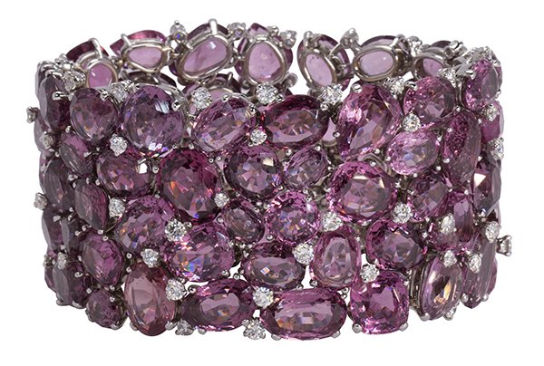 This Verdura Spinel diamond and 18K white gold bracelet composed of 69 oval-shaped and 14 pear-shaped purplish spinels with a total weight of 225 carats, sold for $48,400. Clars Auction Gallery image