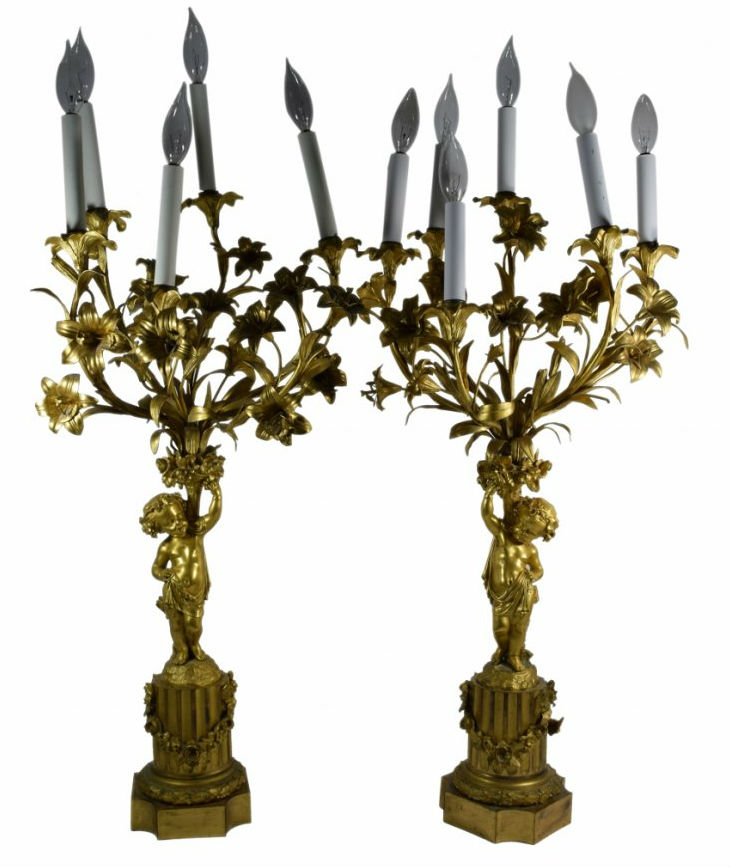 Pair of bronze candelabra, 34 inches high, purchased from Mohammad Reza Pahlavi, the deposed Shah of Iran (est. $1,000-$10,000). Auction Life image 