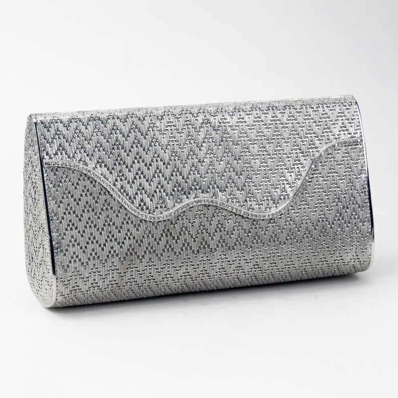 18K white gold and diamond evening clutch. Price realized: $9,680. Kodner Galleries image 