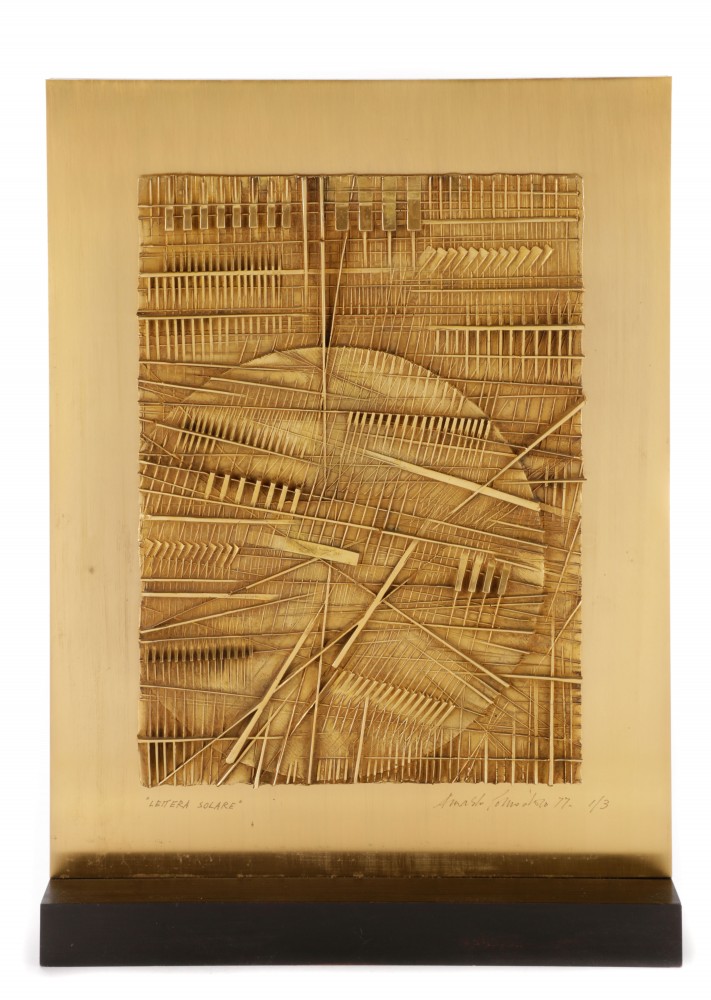 Gilt bronze bas-relief sculpture signed by Italian artist Arnaldo Pomodoro (b. 1926), titled ‘Lettera Solare,’ 1977, 19 inches tall (est. $18,000-$24,000). Ahlers & Ogletree image