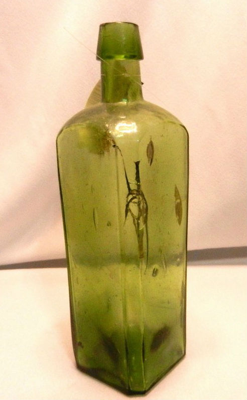 S.S Republic shipwreck artifacts: gin bottle (pictured) and an 1861 U.S. Seated Liberty coin in a wooden presentation box. Estimate: $2,000-$2,500. Jasper52 image
