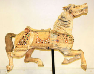Carousel animals making the turn at Kaminski Auctions July 21