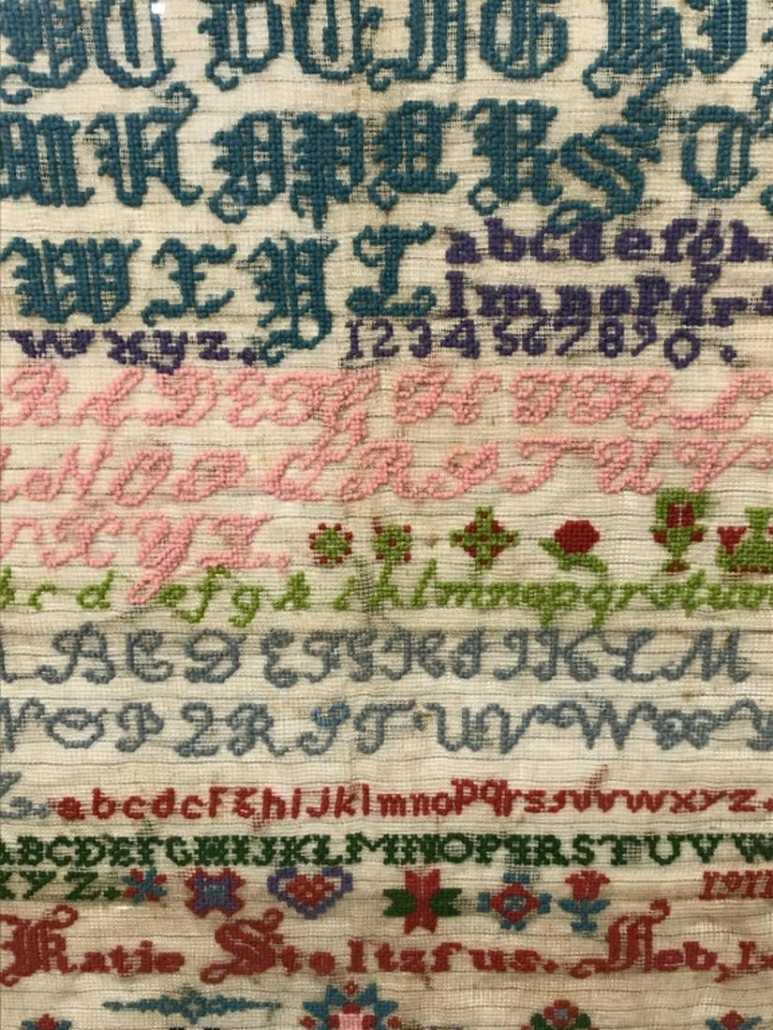 Among alphabet samplers is a Pennsylvania Amish sampler wrought by Katie Stoltzfus dated February 1, 1911, 25¾ by 18¼ inches 