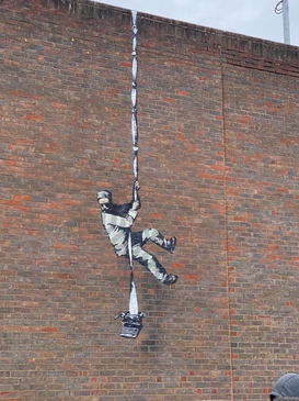 Banksy image painted on the wall of HM Reading Prison