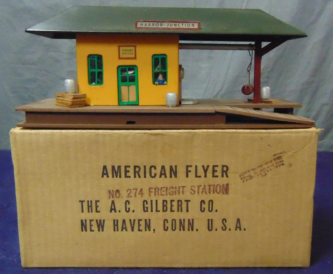 Rare boxed American Flyer no. 274 freight station, very rare green window version with black roof, $600. Image courtesy Weiss Auctions and Live Auctioneers.