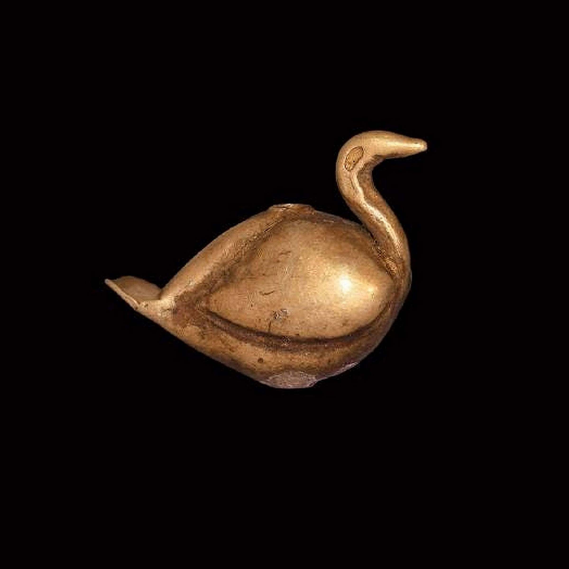 Greek hollow gold amulet shaped like reclining bird, pierced through the middle. 4th-3rd century BC, 1.62 grams, 16mm. Realized £160 + buyer’s premium in 2019. Image courtesy TimeLine Auctions Ltd. and LiveAuctioneers.