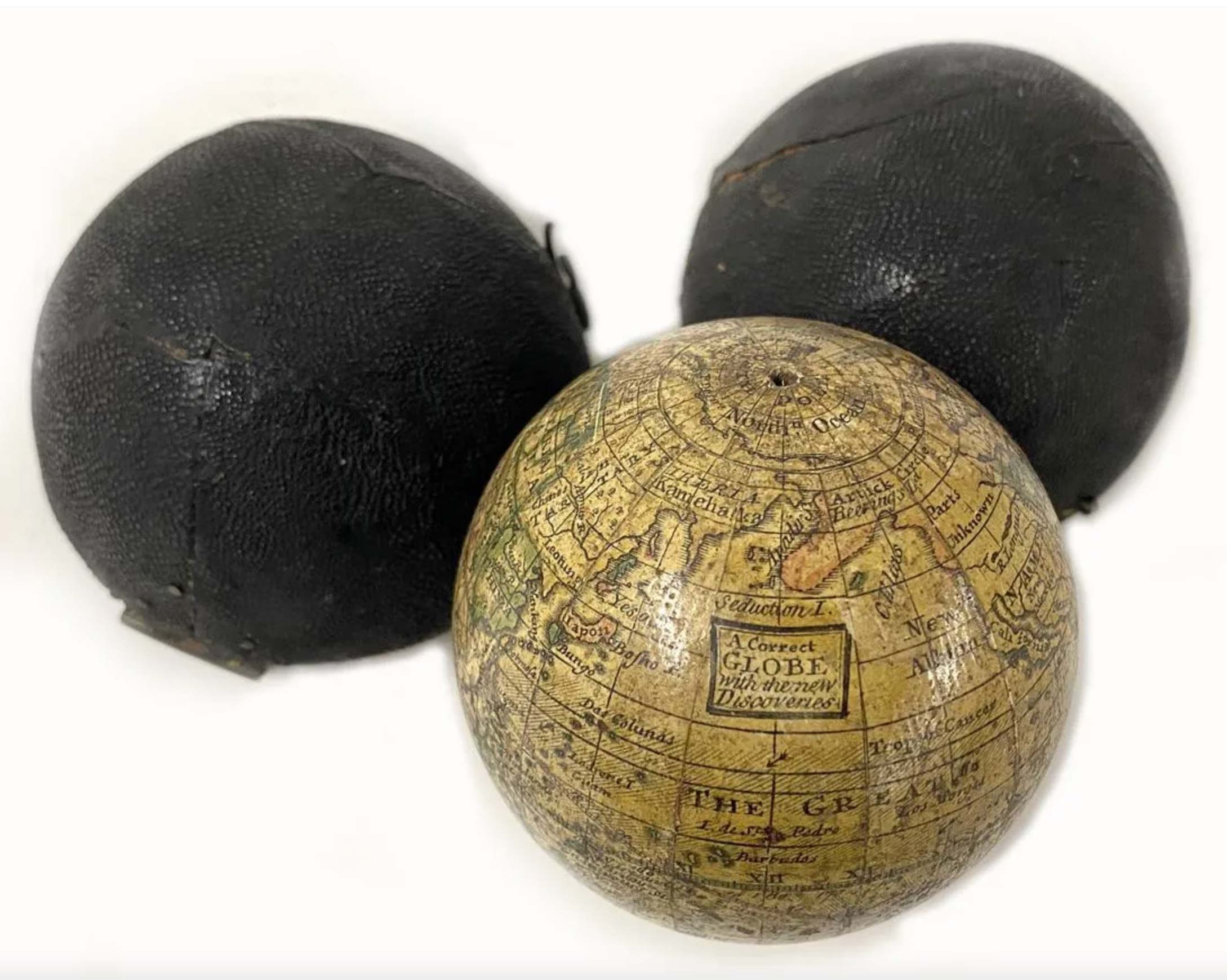 Miniature terrestrial pocket globe and case, England, 18th century, sold for $5,500. Image courtesy CRN Auctions