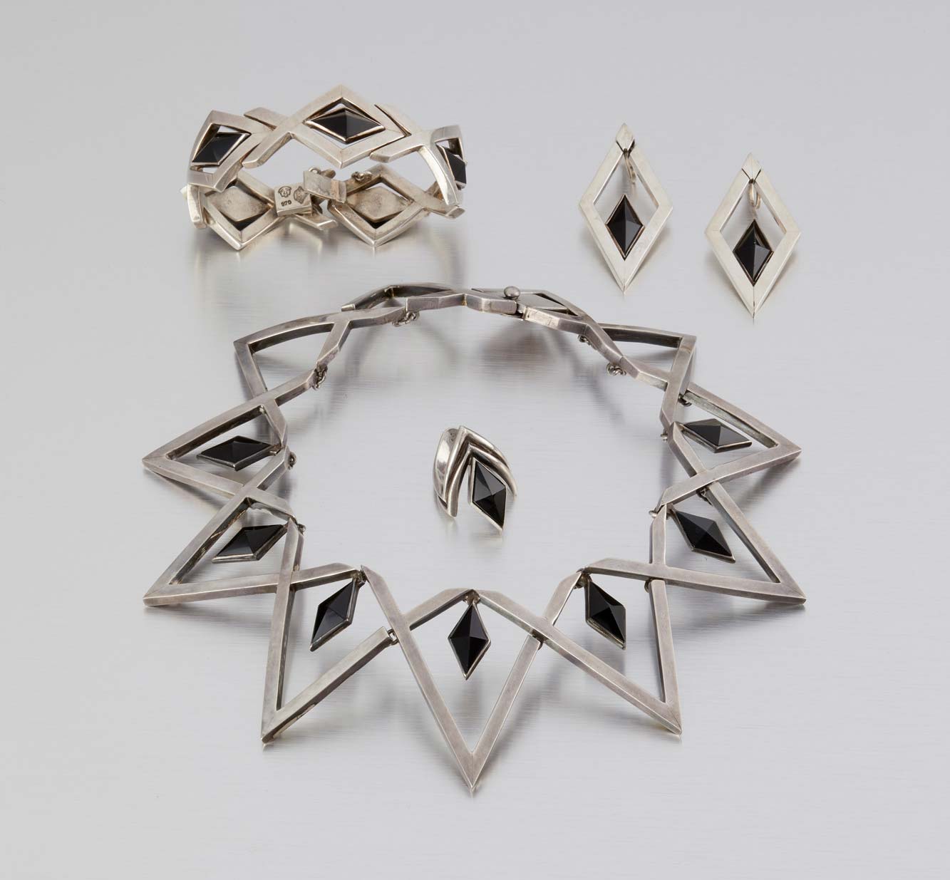A suite of Antonio Pineda silver and obsidian jewelry, $2,000-$3,00. Image courtesy John Moran Auctioneers