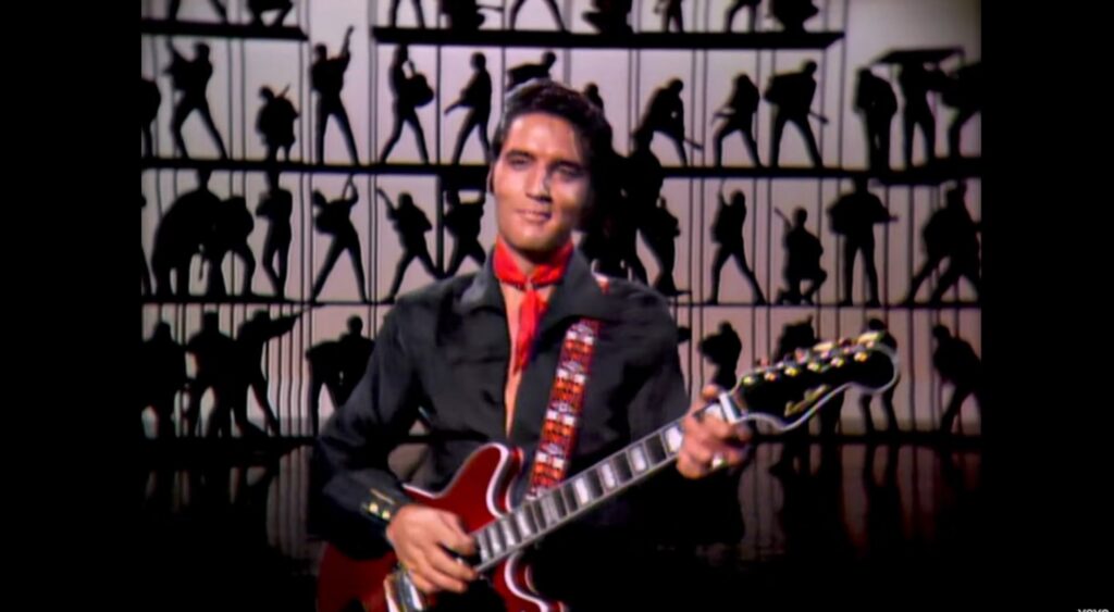 Elvis Presley playing the Hagstrom V-2 guitar on the '68 Comeback Special. Image courtesy GWS Auctions