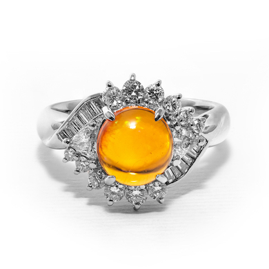 Platinum, fire opal, and diamond ring
