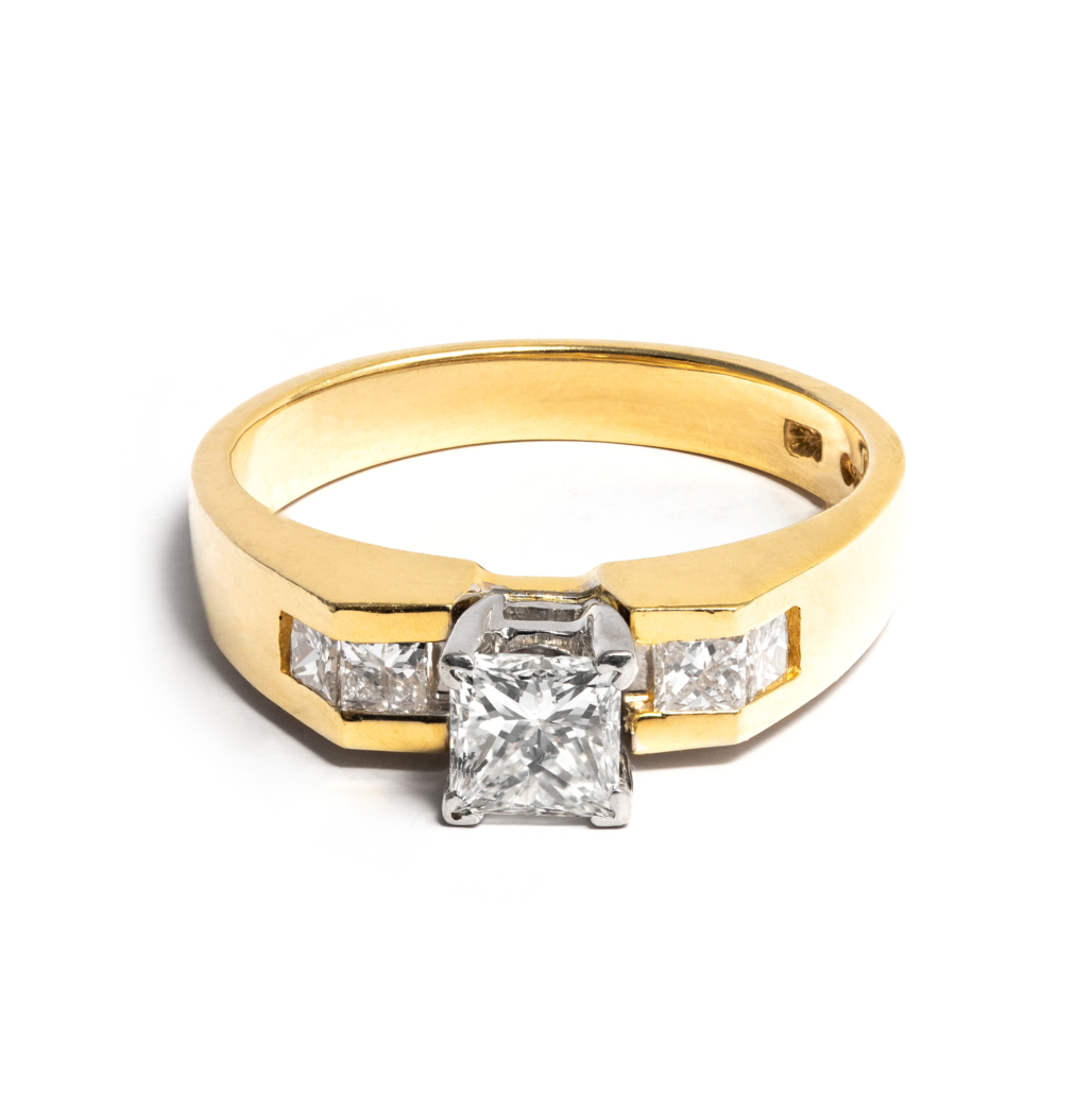 14k yellow gold diamond ring crowned with a square brilliant-cut stone, estimated at $3,100 to $3,700