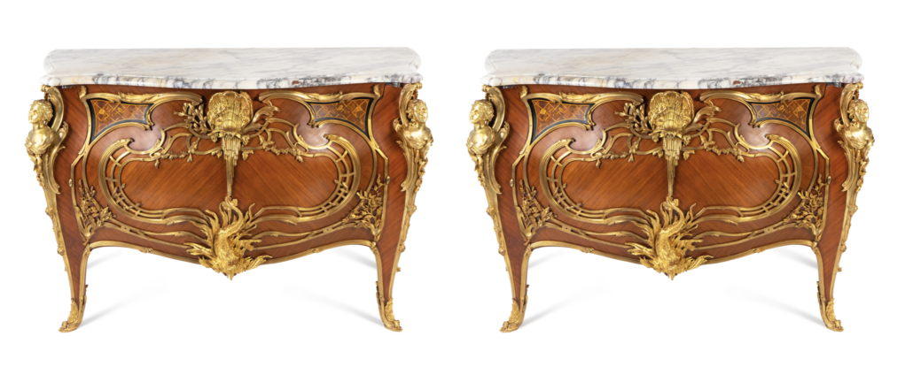 a pair of Louis XV style gilt bronze mounted marble-top commodes (lot 250; estimate: $10,000-15,000)