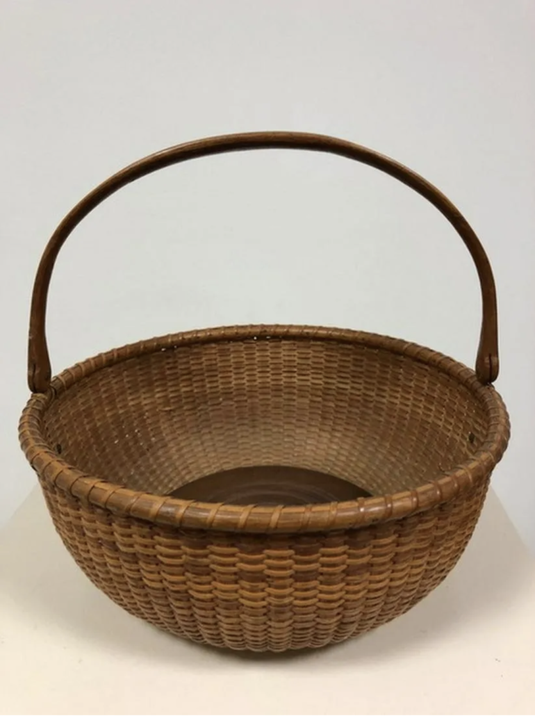  Nantucket basket with 10-in diameter handle, estimated at $3,000-$4,500