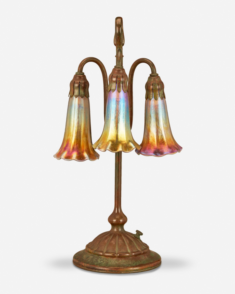 Tiffany Studios three-light lily table lamp, sold for $8,750 