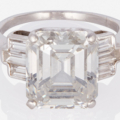 Emerald-cut diamond ring with flanking baguettes, estimated at $120,000-$180,000