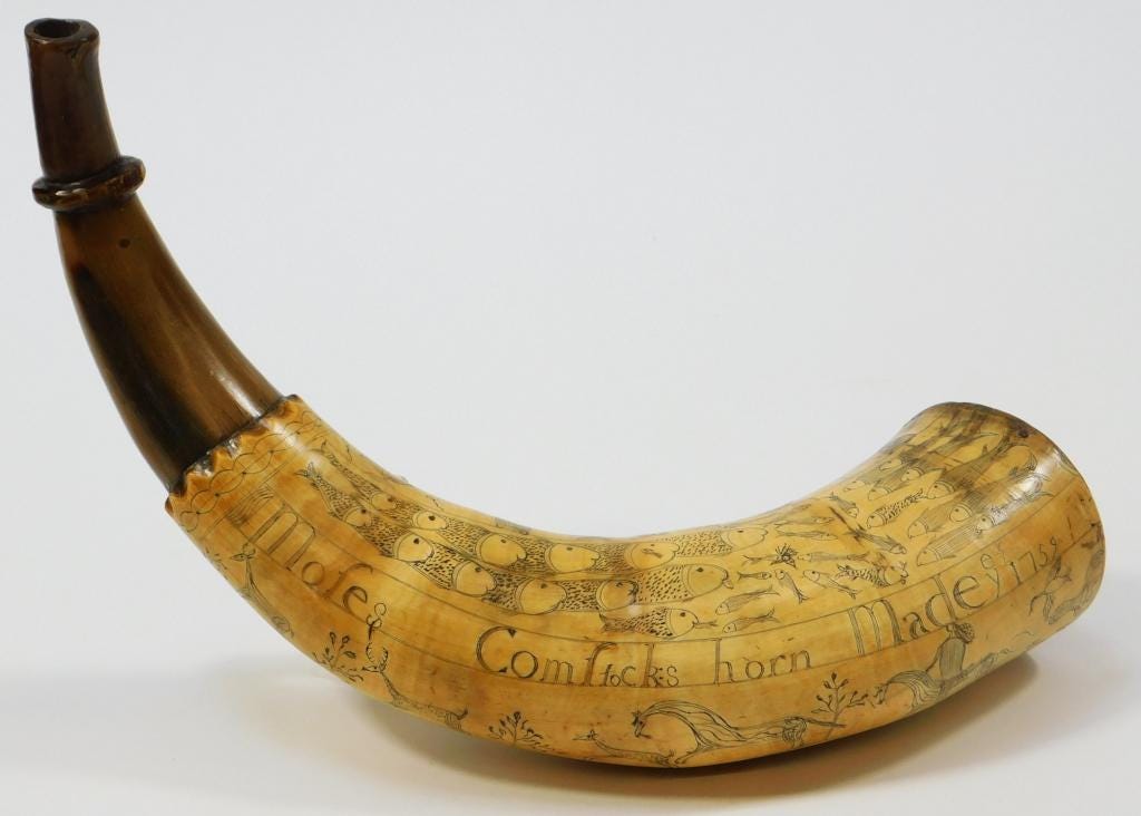 A powder horn from 1759 belonging to Moses Comstock, estimated at $7,000-$9,000