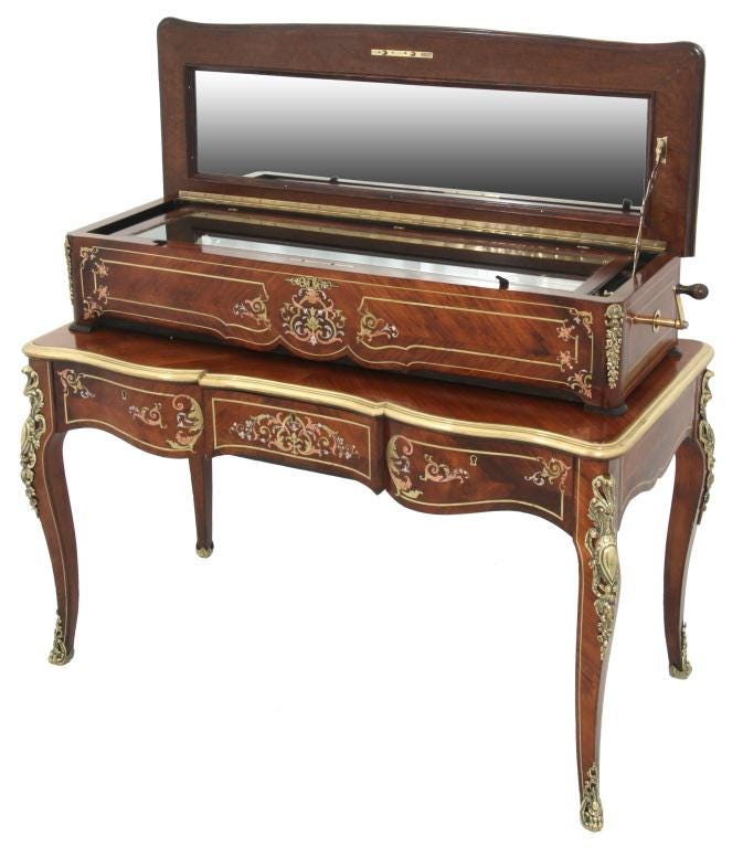 A Mermod Freres marquetry cylinder music box made $25,000 plus the buyer’s premium in January 2021. 