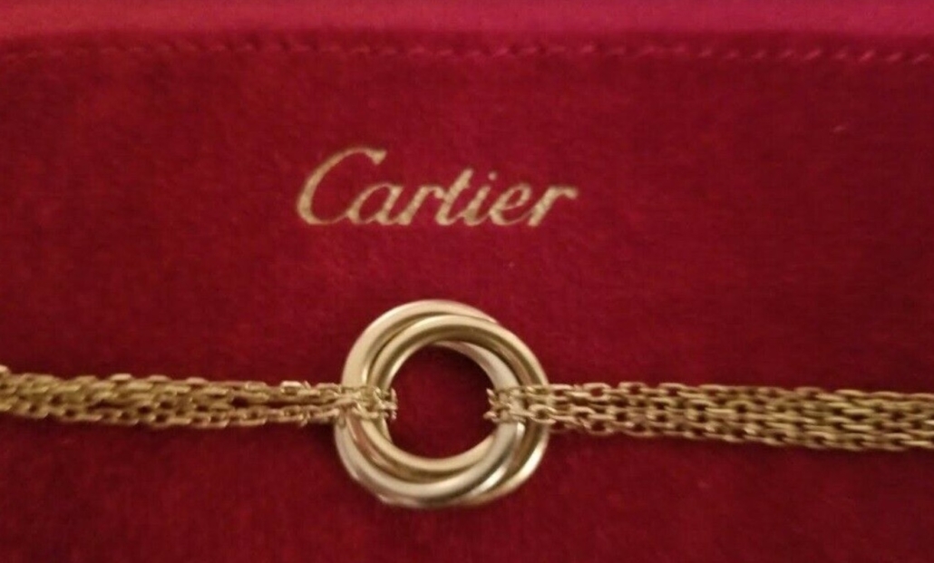 Cartier 18K gold trinity tri-color chain bracelet, estimated at $2,200-$3,500