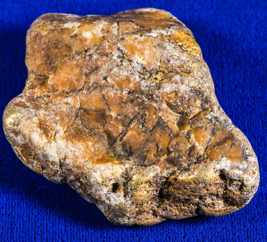 Gold metal and white quartz nugget, weighing 6.15 troy ounces and comprised of about 65 percent gold metal, estimated at $7,000-$9,000