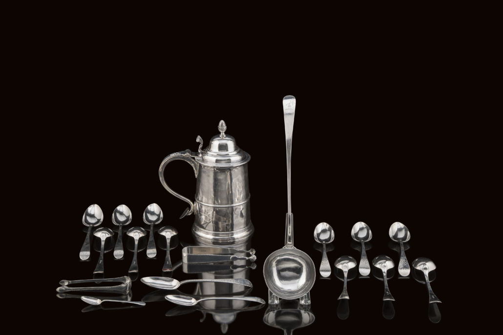Group shot of several pieces of Paul Revere silver in the May 20 auction