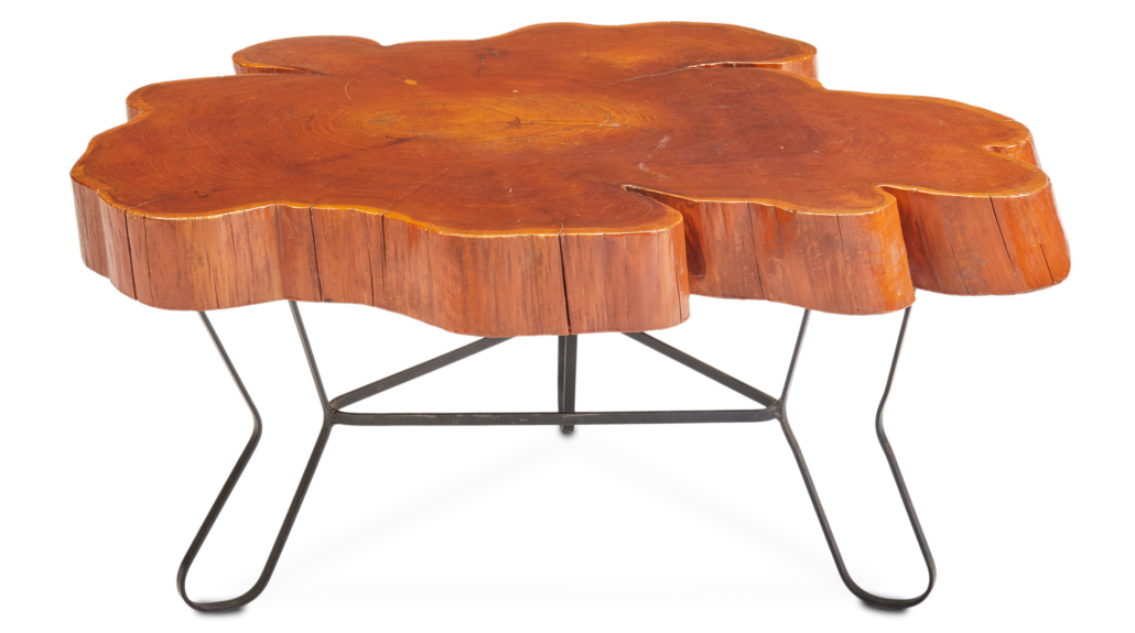 Free-form natural wood and iron cocktail table, estimated at $800-$1,200