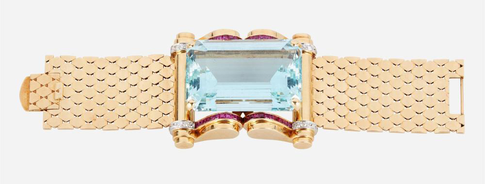 Retro aquamarine, ruby, and diamond bracelet in 14K gold, which sold for $12,500