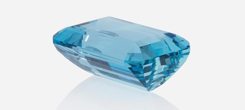 Giant unmounted aquamarine weighing 61.45 carats, which sold for $11,250