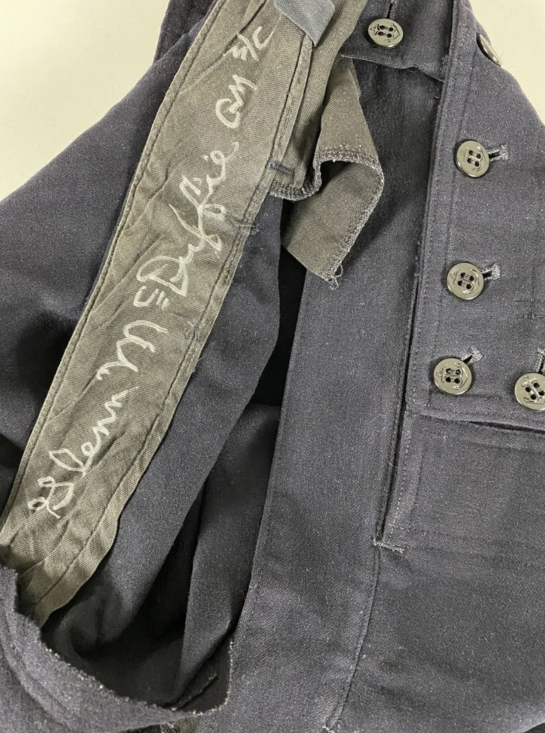 McDuffie also signed the waistband of the pants of his sailor uniform.