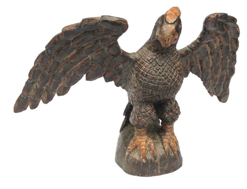 Boasting a 21-in wingspan, this carved spread wing eagle in original paint sold for $35,000 plus the buyer’s premium in October 2014 at Flying Pig Auctions.