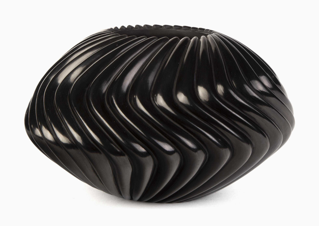 A large Nancy Youngblood 32-rib swirl melon bowl earned $8,000 plus the buyer’s premium in February 2021 at Santa Fe Art Auction.