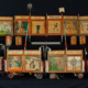 Folk art toy circus sideshow wagon train, estimated at $2,000-$3,000