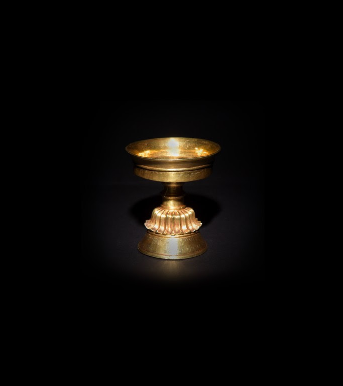 Tibetan gold butter lamp, estimated at $165,000-$200,000