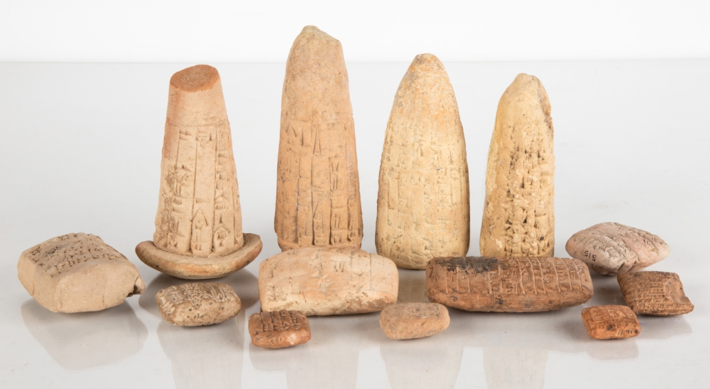 Group of cuneiform tablets and votive cones, which sold for $22,800