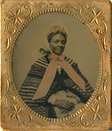 Circa-1863 tintype of a finely dressed African American woman, estimated at $750-$1,250