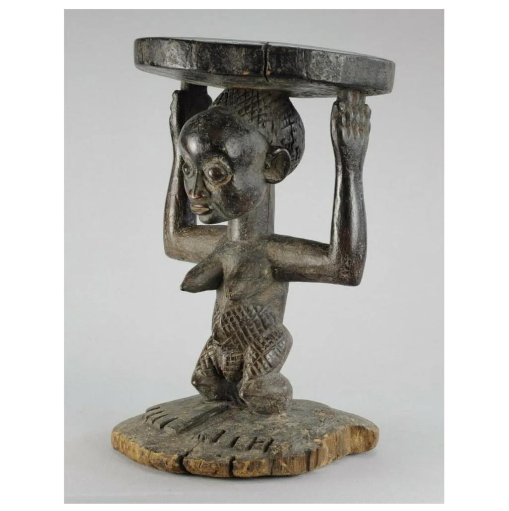 Luba Kanyok stool with cariatid, estimated at $2,000-$2,500