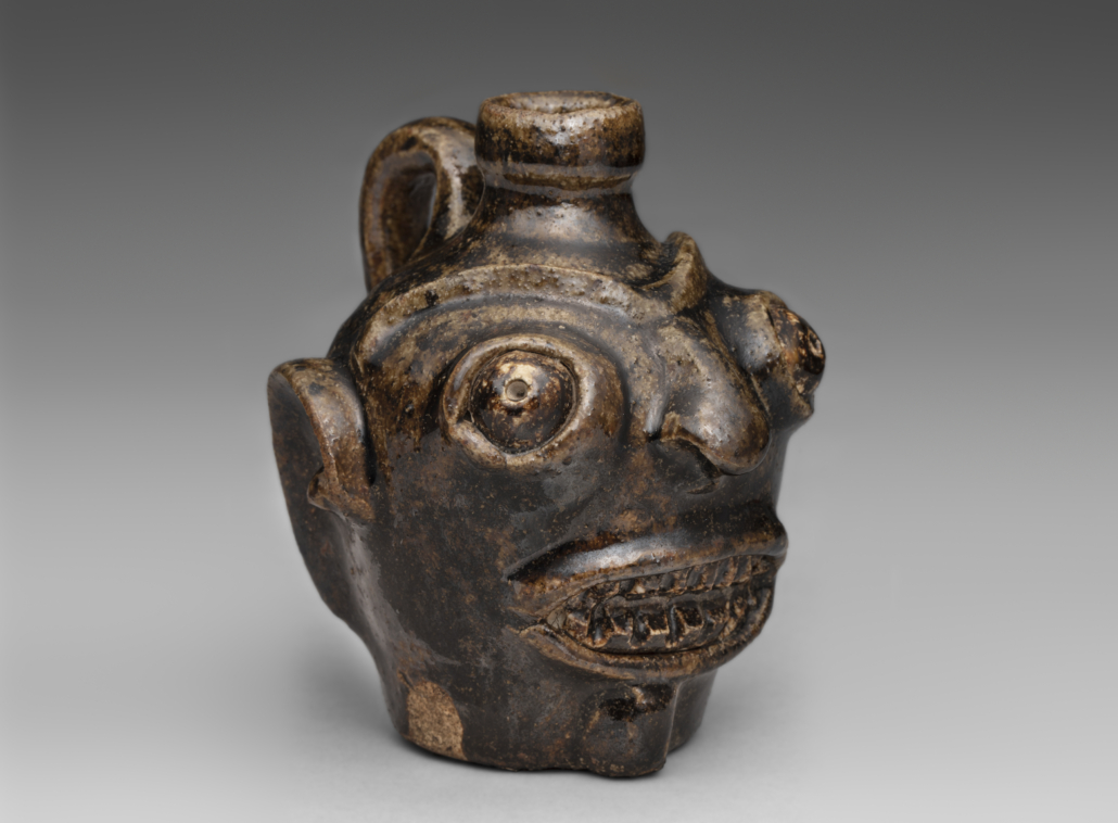 Face jug created circa 1862 by an unidentified enslaved African American potter, from the collection of Kenneth Fechtner. Courtesy of SFO Museum