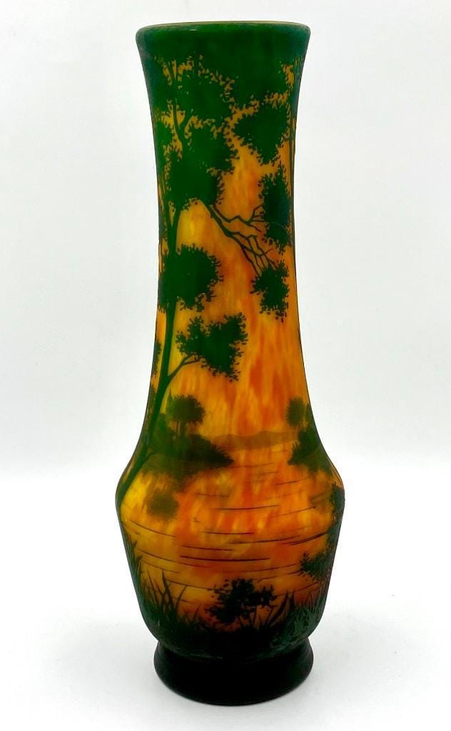 Daum Nancy glass vase of baluster form, estimated at $2,500-$5,000
