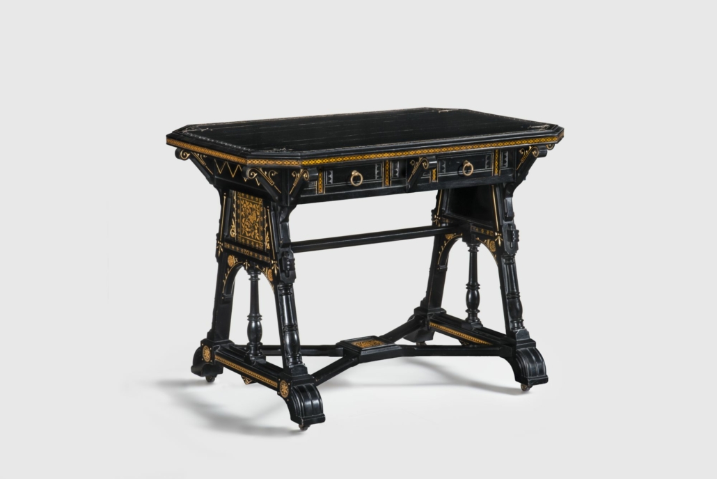 Kimbel and Cabus (New York, 1863–82). Table, circa 1875. Ebonized wood, paper, gilding, metal. 30 7/8 × 42 × 27 in. (78.4 × 106.7 × 68.6 cm). Collection of Barrie and Deedee Wigmore. (Photo: Gavin Ashworth) 