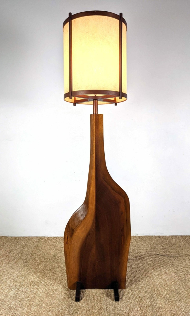 George Nakashima live edge walnut floor lamp on a trestle base from the Katherine Mezger collection, estimated at $5,000-$8,000