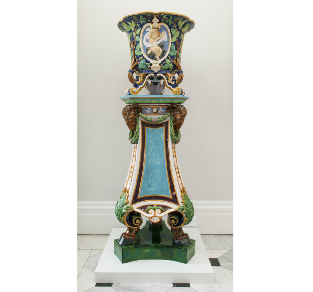 Majolica tripod ram-footed pedestal by the Minton Ceramics Manufactory, early 1870s to 1883, gift of Deborah and Philip English. Courtesy of the Walters Art Museum.
