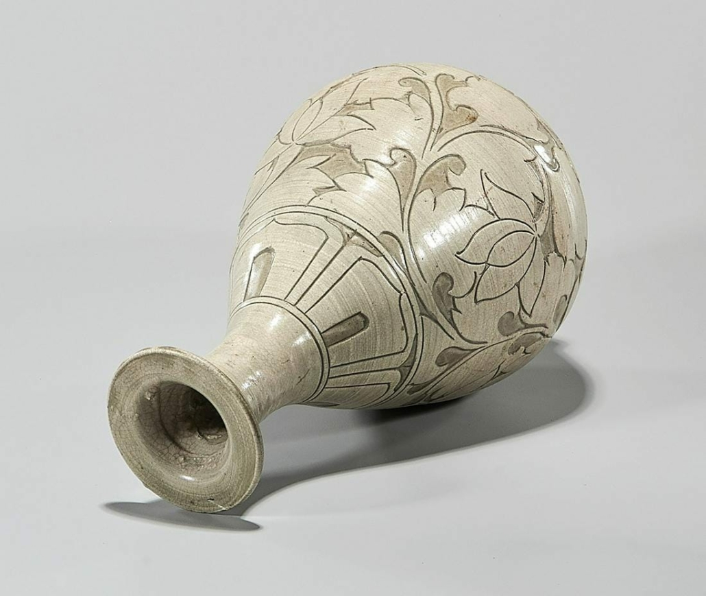 Floral designs grace this glazed and incised ceramic vase, which garnered $15,000 plus the buyer’s premium in January 2021 at I.M. Chait Gallery/Auctioneers.
