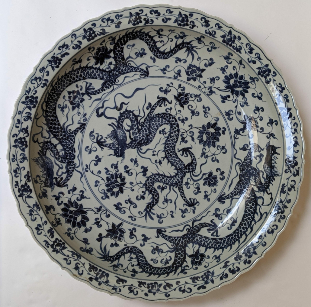 Chinese blue and white porcelain dragon charger, est. $1,000-$1,500