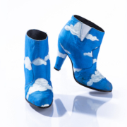 Prince wore these iconic blue ankle boots with hand-painted white clouds in his 1986 Raspberry Beret music video, along with a matching suit. These shoes were made before Prince had his cobblers reinforce his heels, so two identical pairs of the shoes were made for (and survived) the arduous production of the music video. Photo credit: John Wagner Photography © 1985-2021 The Estate of Prince Rogers Nelson. All rights reserved.