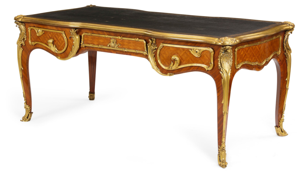 Louis XV-style gilt bronze mounted parquetry bureau plat, est. $7,000-$9,000