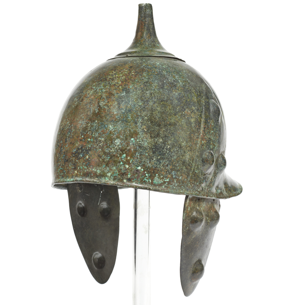 Etruscan Montefortino-type bronze helmet, est. €20,000-€30,000. Image courtesy of Bonhams