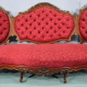 Rosewood triple-back sofa attributed to Alexander Roux, est. $1,000-$2,000