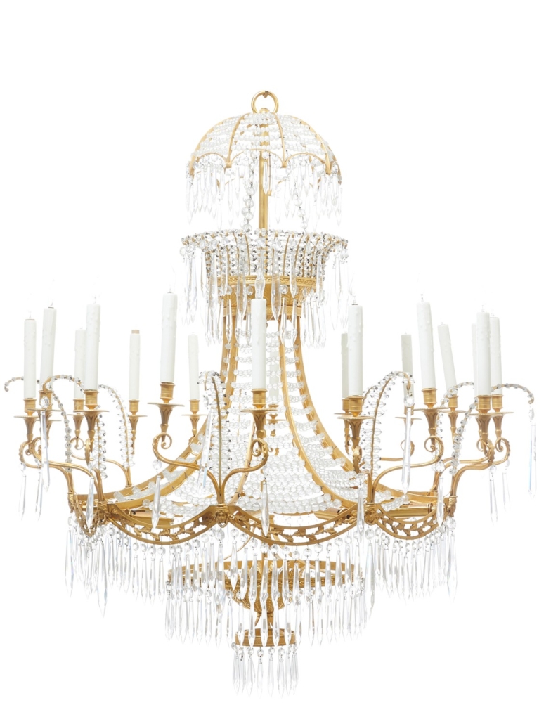 One of pair of French gilt bronze and cut glass 18-light chandeliers, $20,000