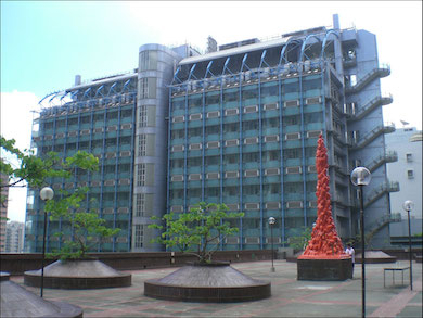 Jens Galschioet’s ‘Pillar of Shame’ sculpture in Haking Wong Podium of the University of Hong Kong. The Hong Kong Alliance in Support of Patriotic Democratic Movements of China painted it orange in 2008 to highlight The Color Orange, a project created by Galschioet to raise awareness of violations of human rights in China. Photograph via Wikimedia Commons, licensed under the Creative Commons Attribution 3.0 Unported license.