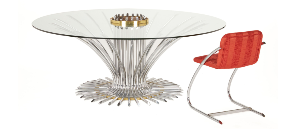Circular tubular chrome/glass/brass monumental dining table with nine chairs, est. $5,000-$7,000 